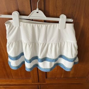 Lucky in love tennis skirt with built-in shorts. Size 8 to 10 medium.